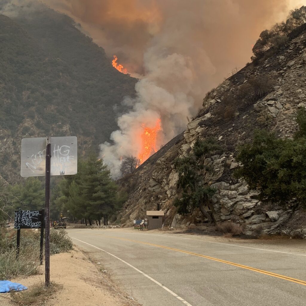 Road leading to fire within valley